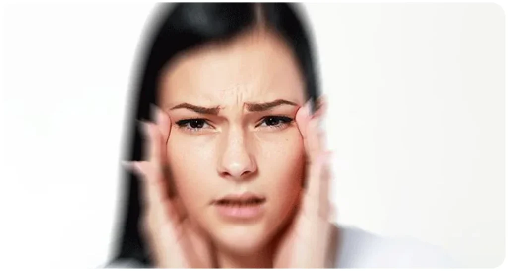 woman migraine aura head pain